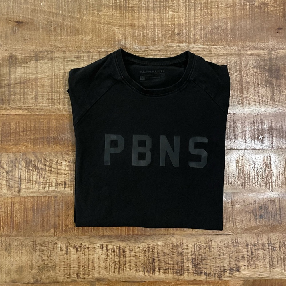 Alphalete ‘PBNS’ Short Sleeve Tee